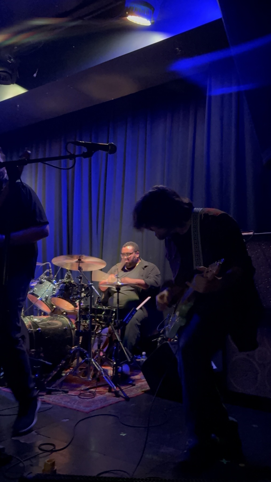 Drummer and guitarist locked in at Pearl Street Warehouse